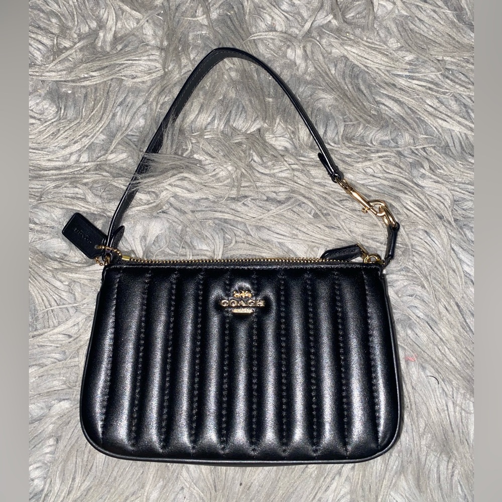 Coach Nolita 19